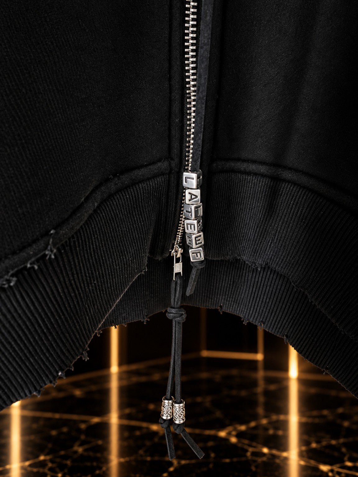 Ascended Uniform Lateef silver hardware and distressed hem detail